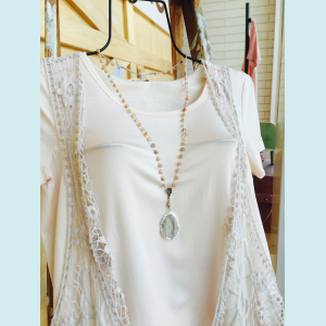 Crocheted necklace of moonstone beads and druzy pendant